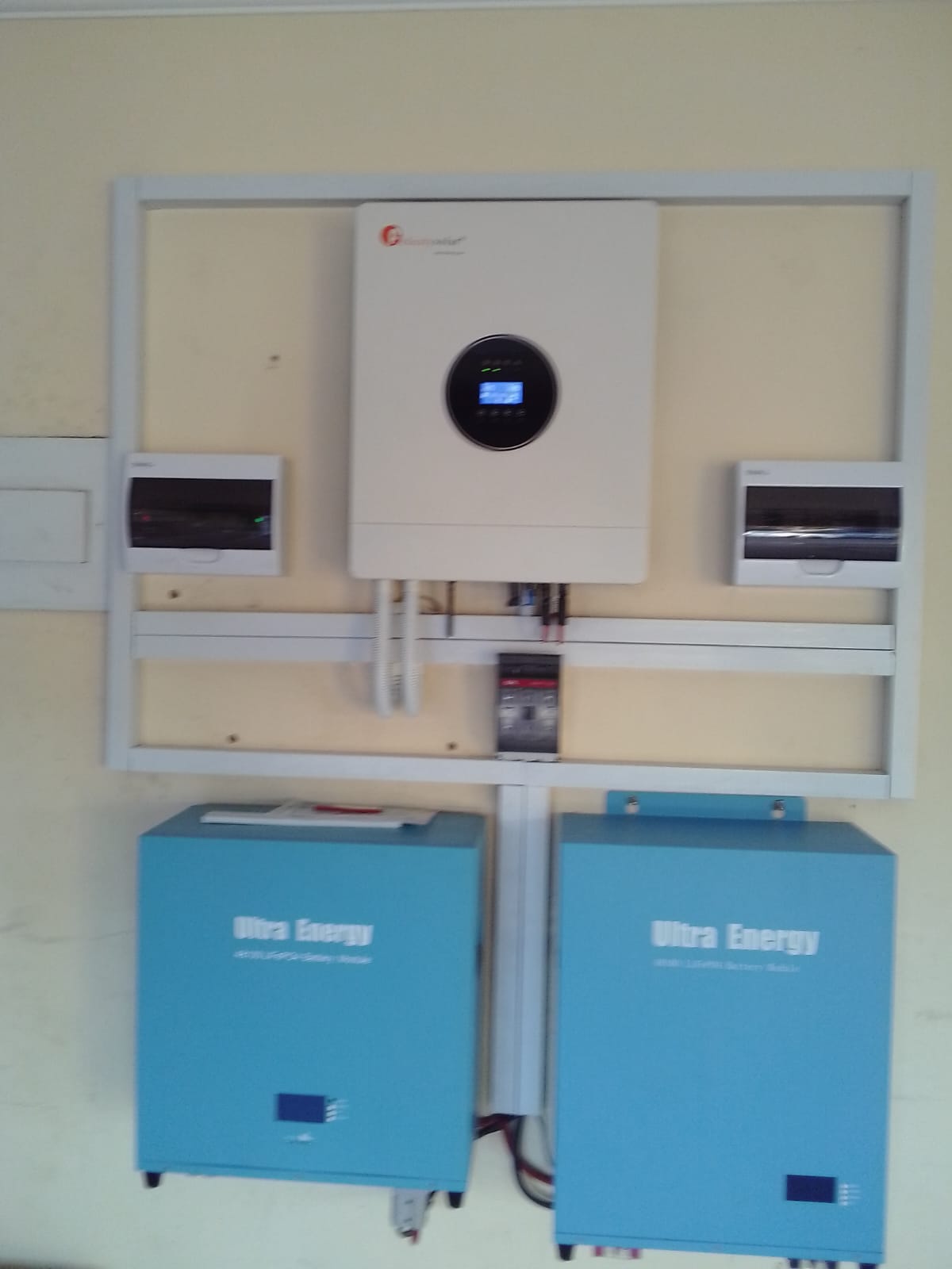 Ultra Energy LiFePO4 lithium battery modules installed with an inverter